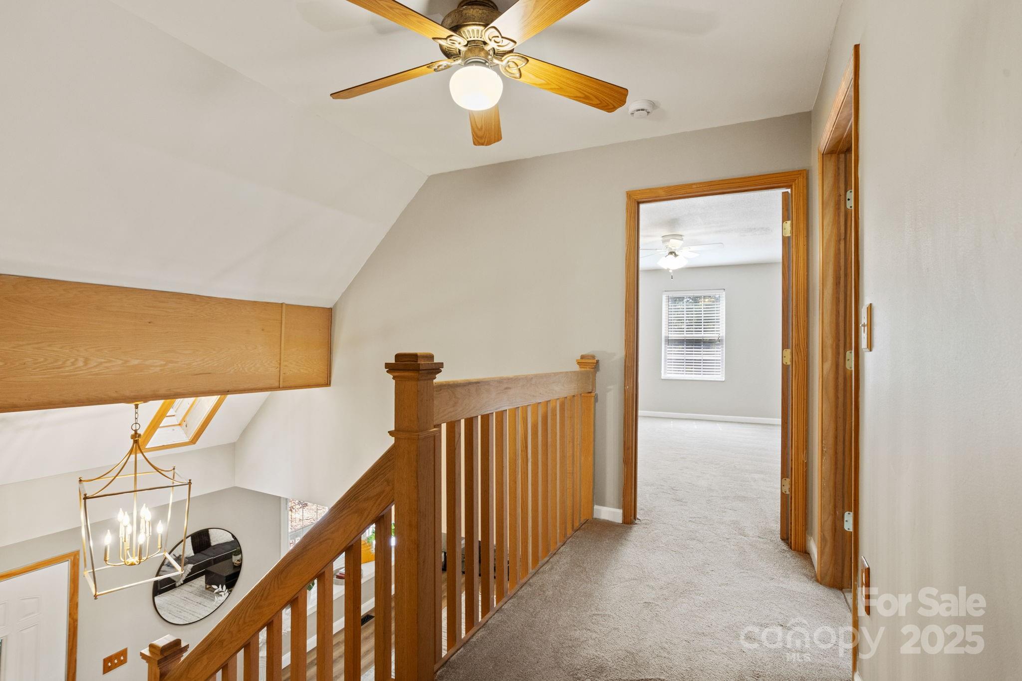 55 Vintage Road Candler, NC 28715 - Photo 21 of 47 a view of a hallway with wooden floor and entryway