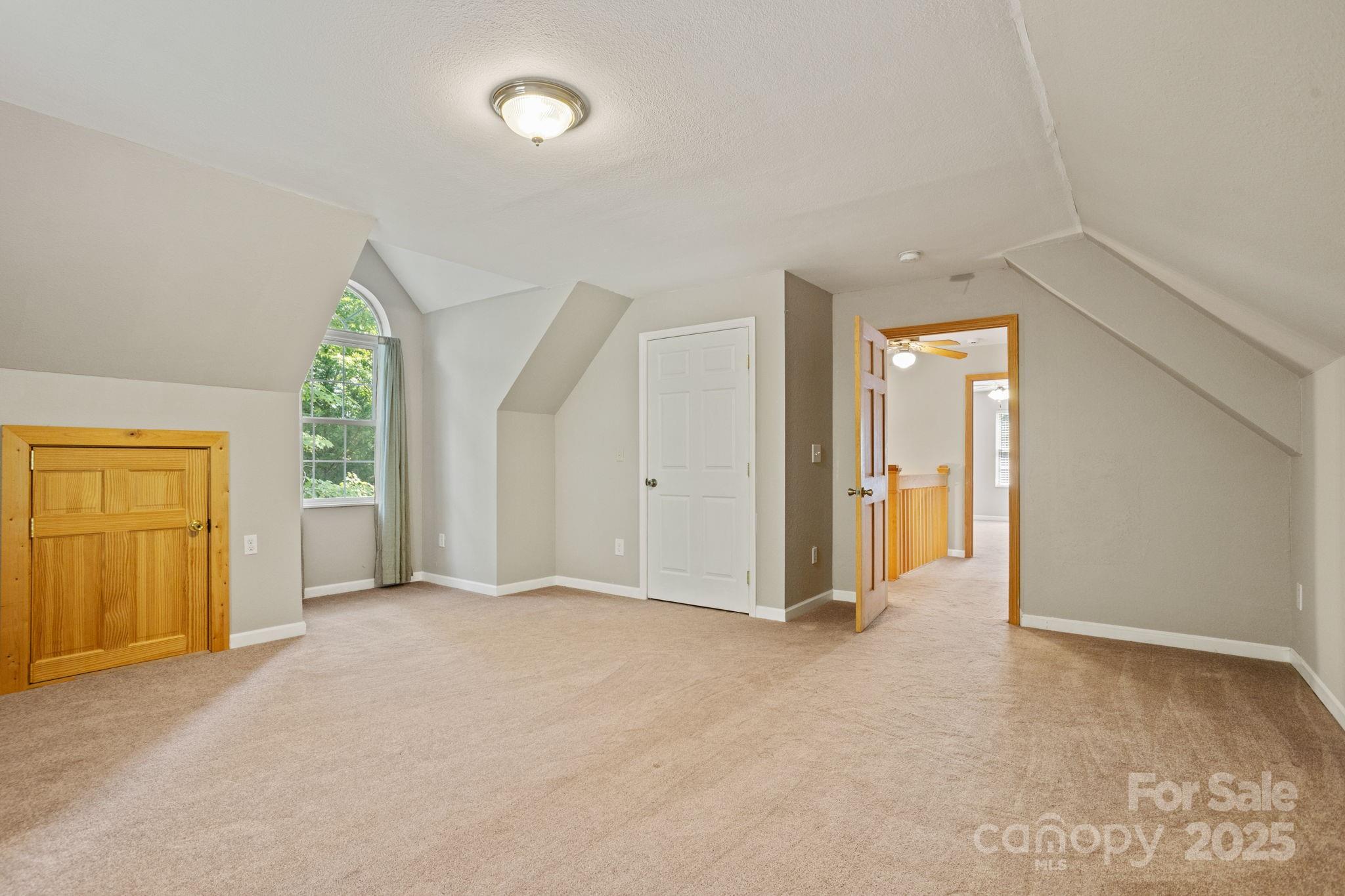 55 Vintage Road Candler, NC 28715 - Photo 22 of 47 an empty room with windows and closet