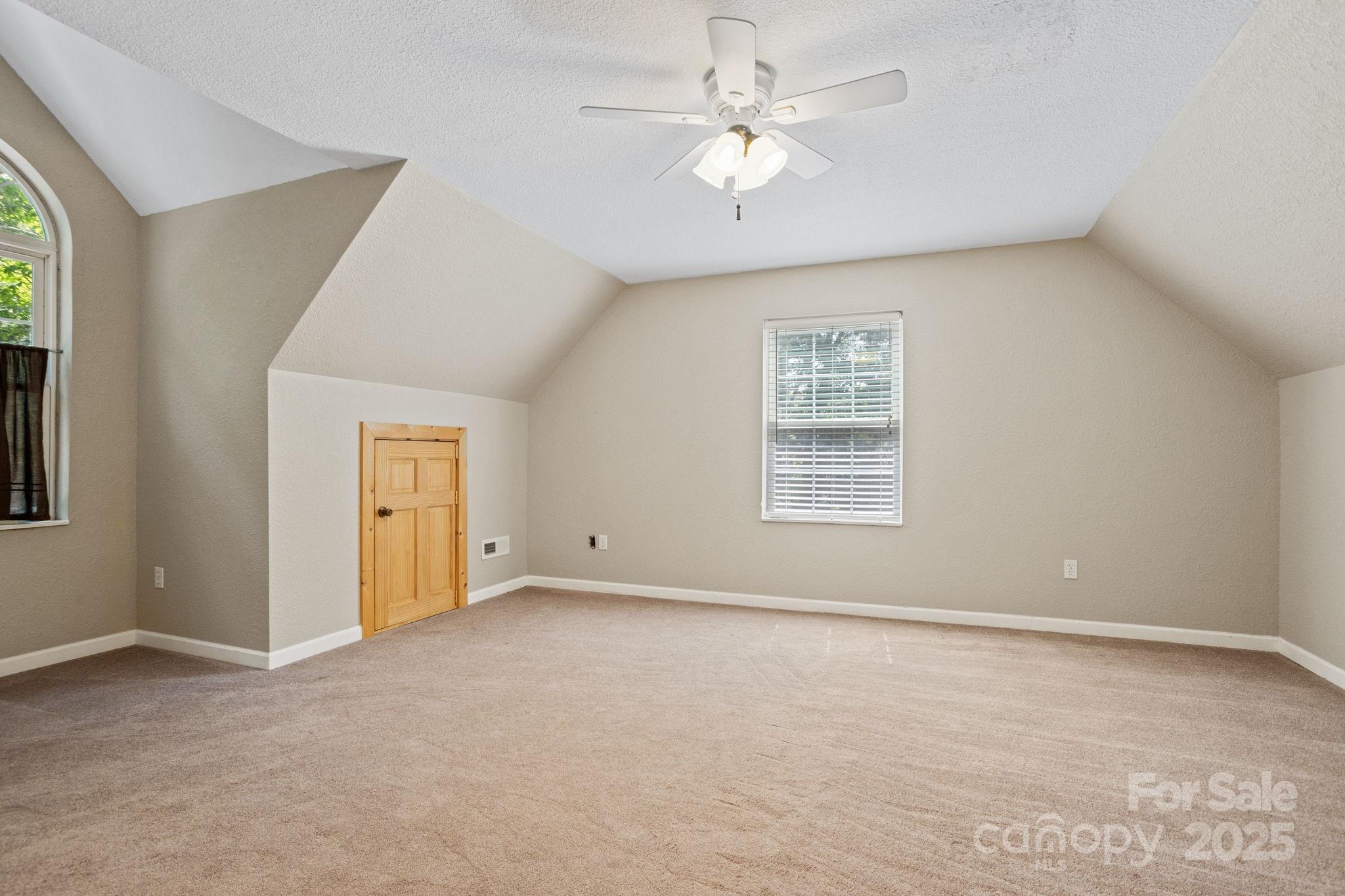 55 Vintage Road Candler, NC 28715 - Photo 26 of 47 a view of an empty room with a window