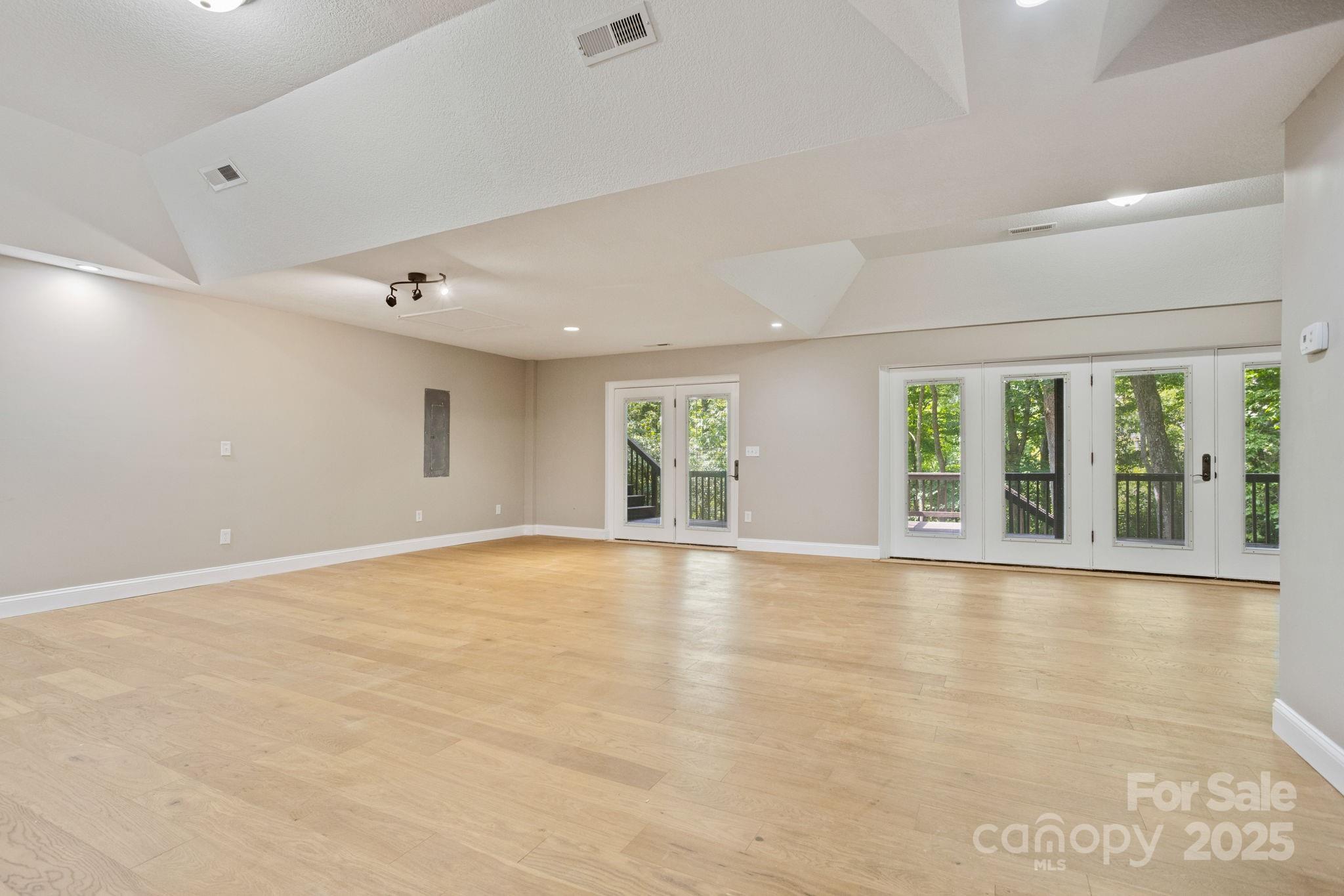 55 Vintage Road Candler, NC 28715 - Photo 30 of 47 a view of an empty room with a window