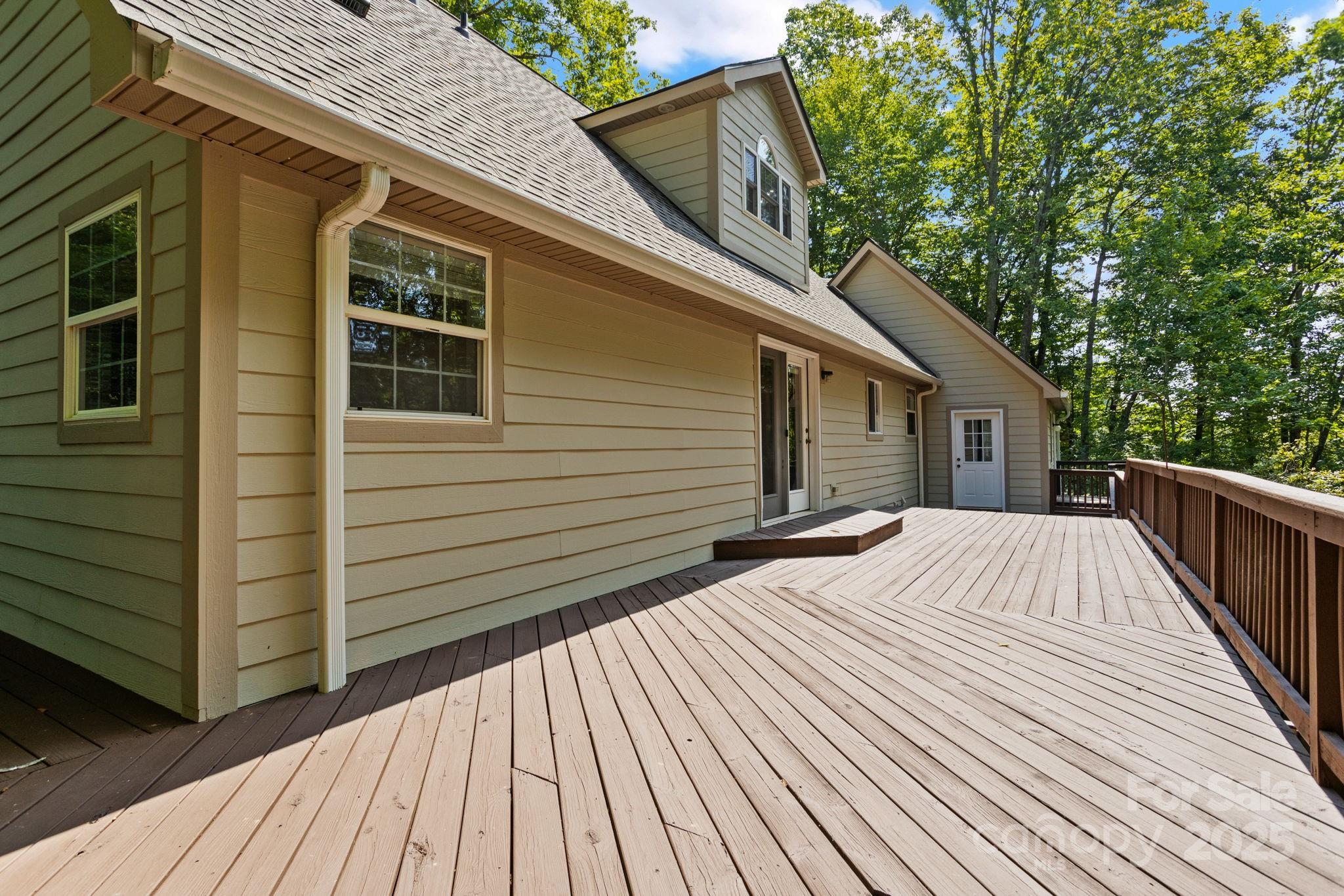 55 Vintage Road Candler, NC 28715 - Photo 36 of 47 a view of backyard with a deck