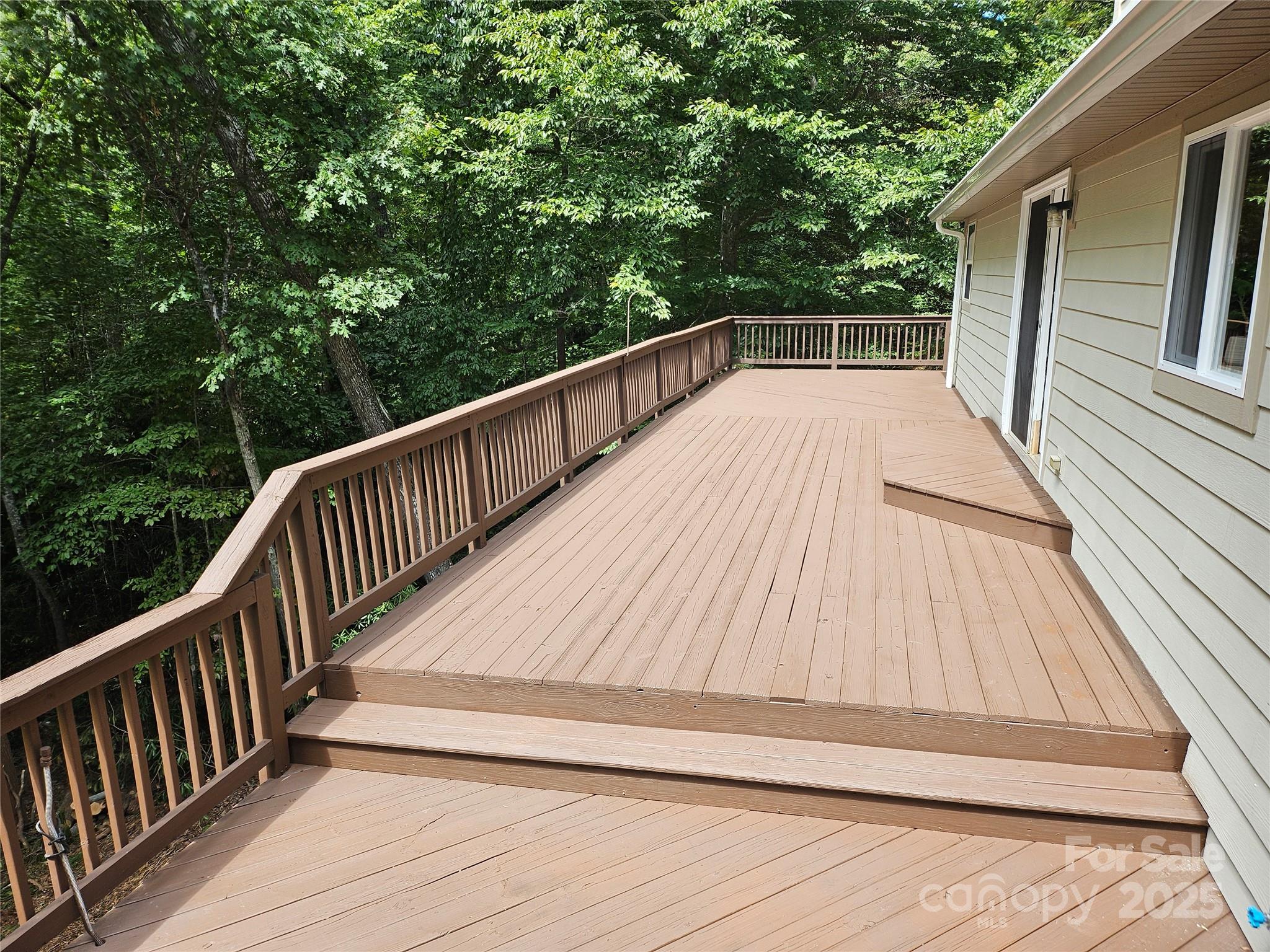 55 Vintage Road Candler, NC 28715 - Photo 37 of 47 a view of balcony with wooden floor and fence