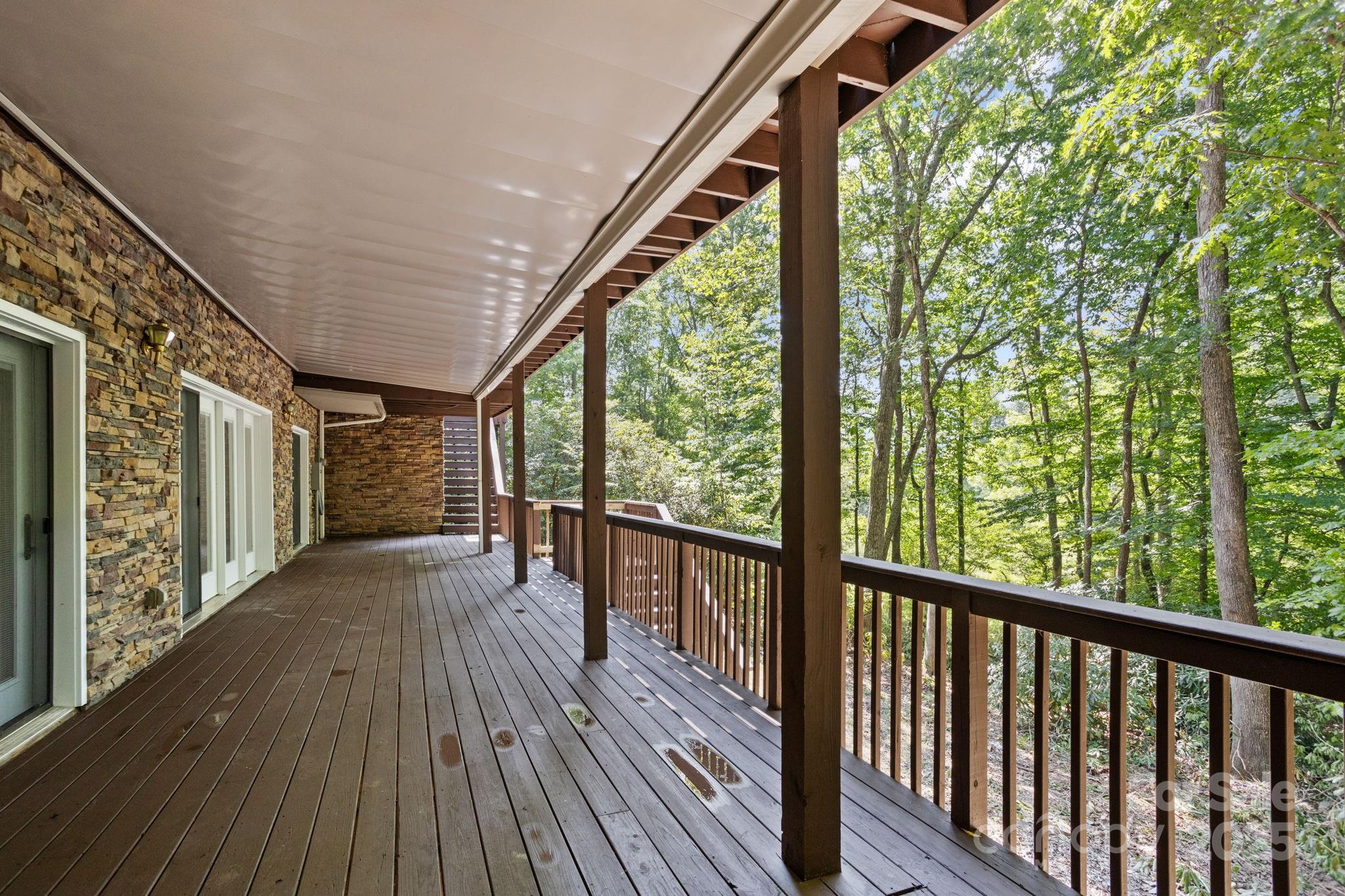 55 Vintage Road Candler, NC 28715 - Photo 39 of 47 a view of balcony with wooden floor