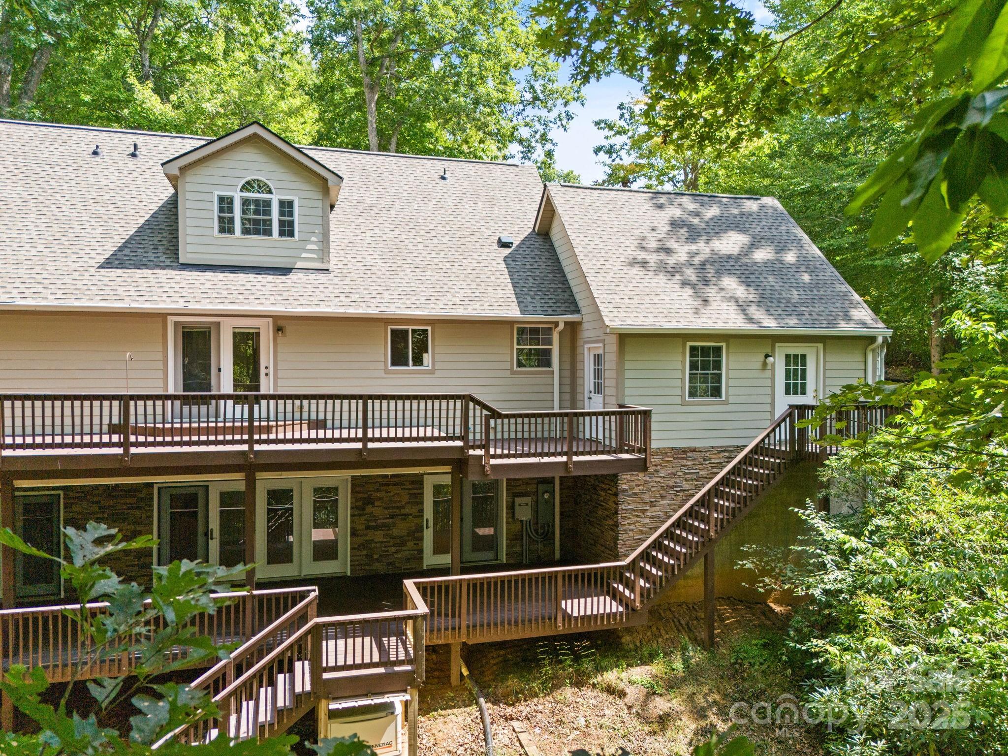 55 Vintage Road Candler, NC 28715 - Photo 41 of 47 an aerial view of a house with a balcony