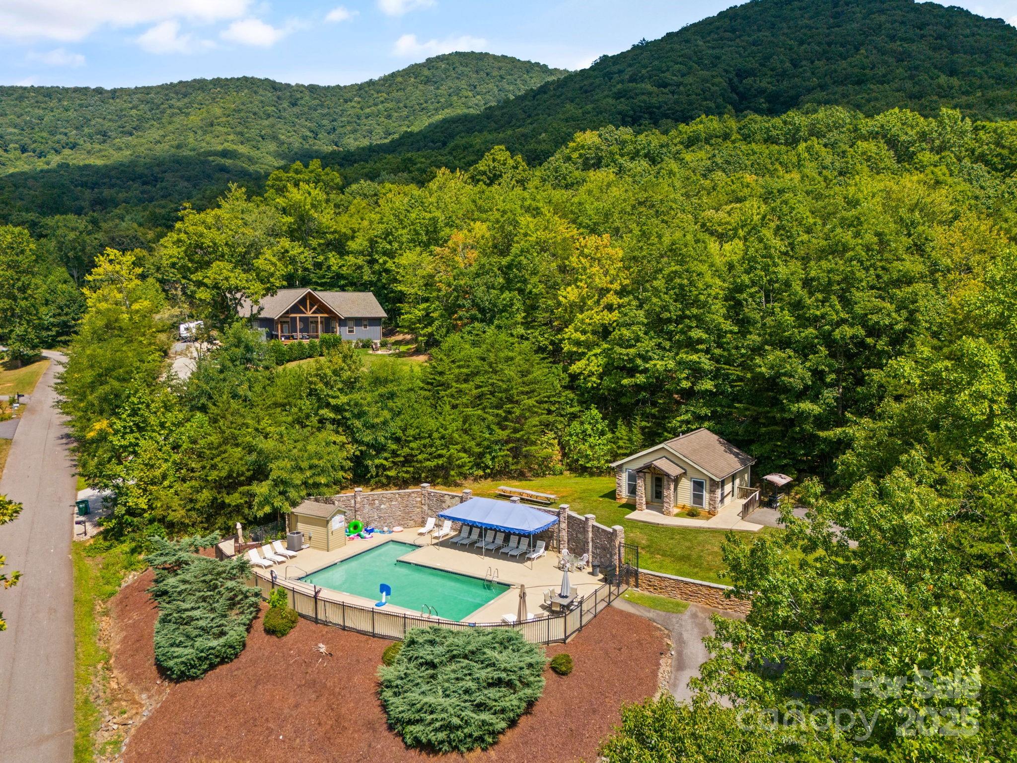 55 Vintage Road Candler, NC 28715 - Photo 43 of 47 an aerial view of a house with mountain view