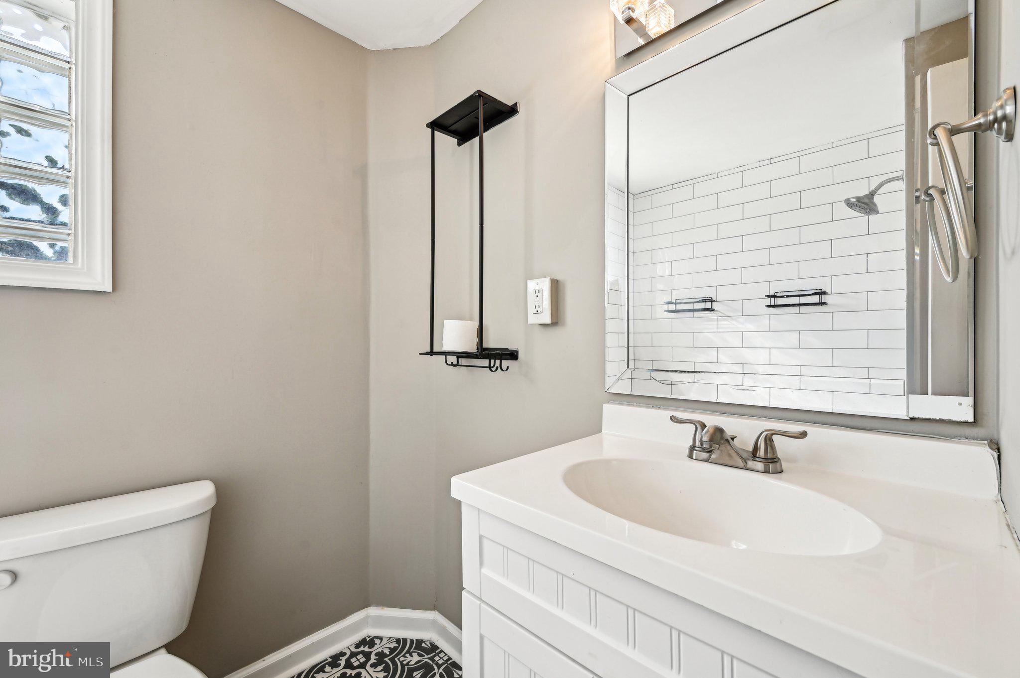 11 Kinship Road Dundalk, MD 21222 - Photo 22 of 46 a bathroom with a sink and a toilet