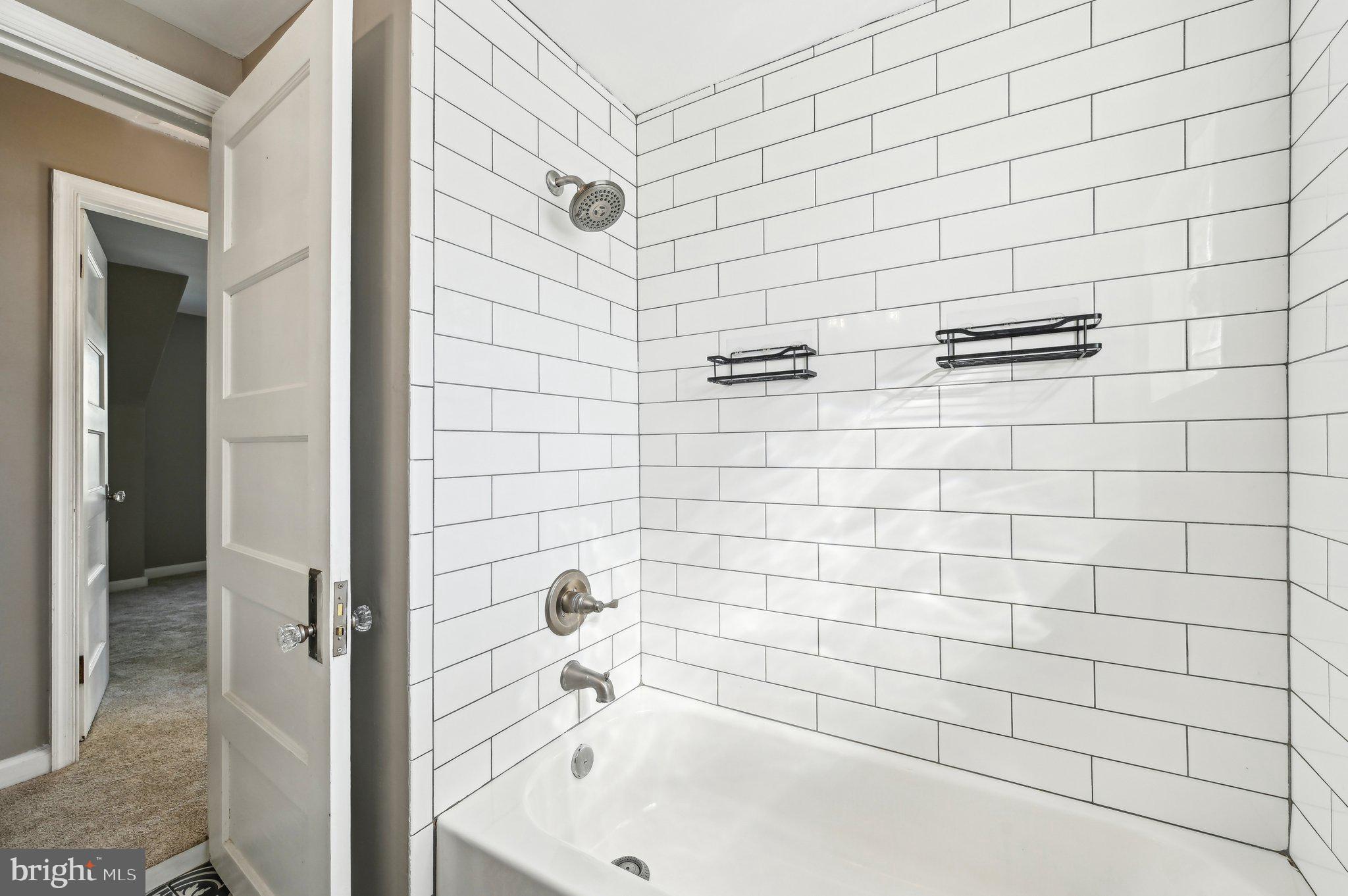 11 Kinship Road Dundalk, MD 21222 - Photo 24 of 46 a bathroom with a bathtub