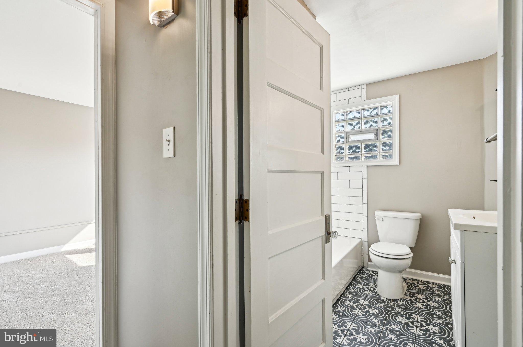 11 Kinship Road Dundalk, MD 21222 - Photo 25 of 46 a bathroom with a toilet and a shower