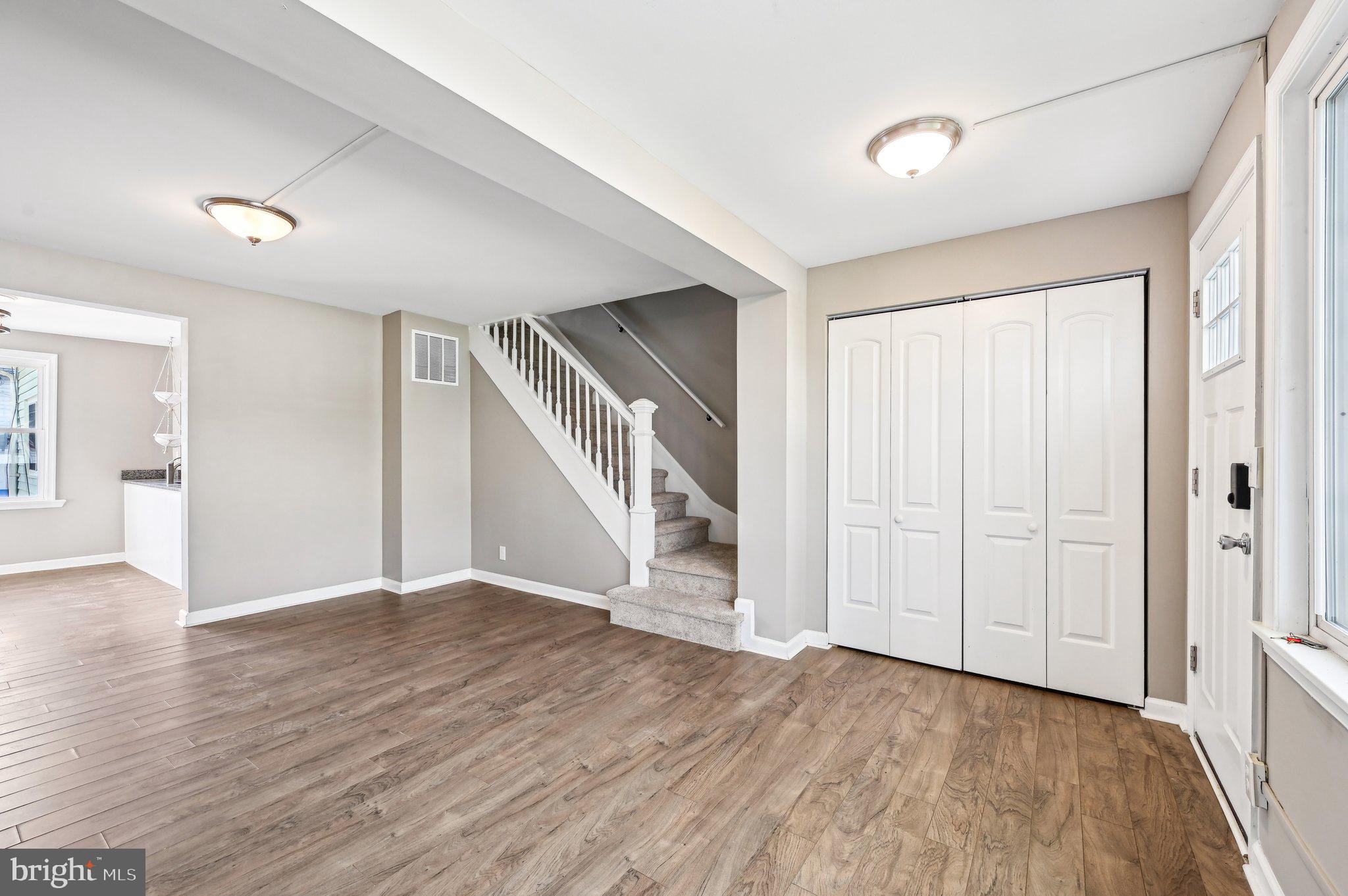 11 Kinship Road Dundalk, MD 21222 - Photo 4 of 46 an empty room with wooden floor and windows