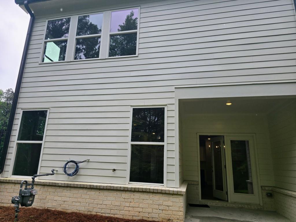 4240 Cavalier Way Duluth, GA 30097 - Photo 36 of 46 a view of a house with windows