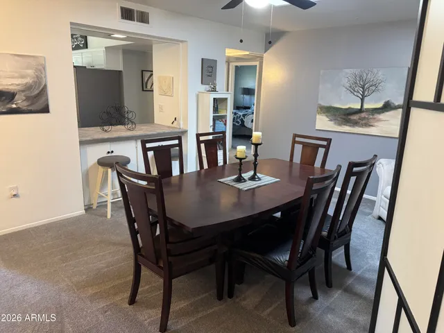 a view of a dining room with furniture