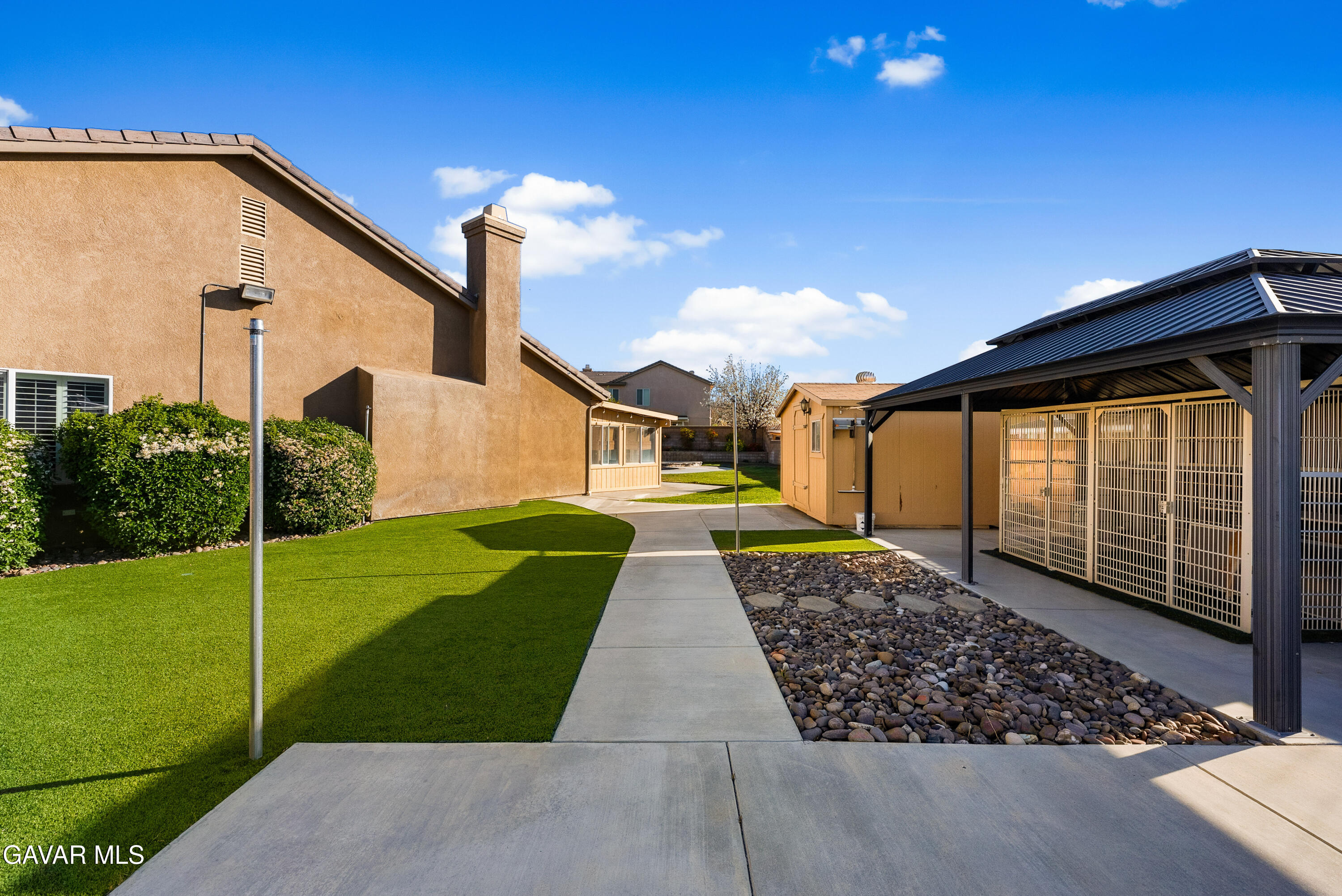 3724 Neola Way Lancaster, CA 93536 - Photo 23 of 31 a front view of a house with garden