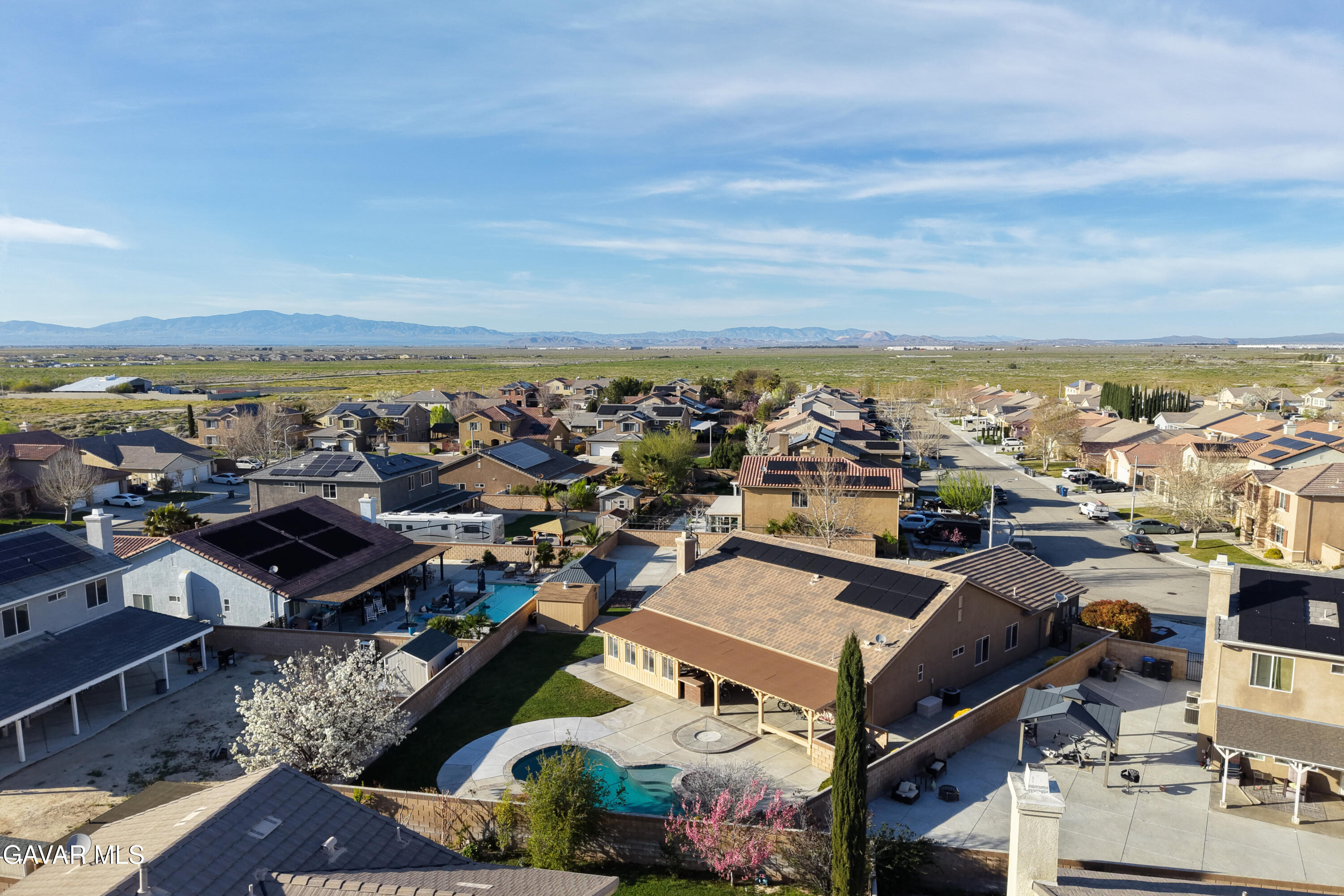 3724 Neola Way Lancaster, CA 93536 - Photo 28 of 31 an aerial view of a city with lots of residential buildings and ocean view in back