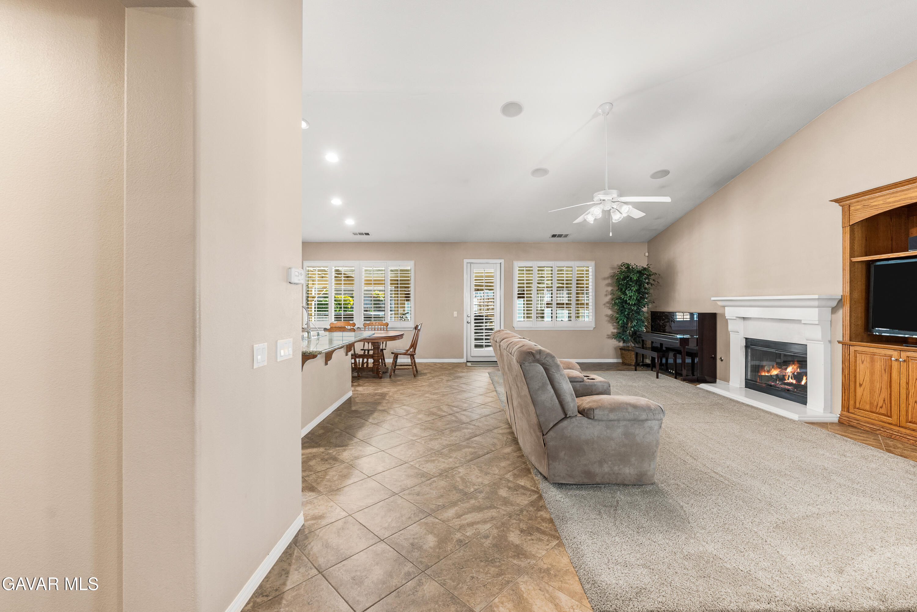 3724 Neola Way Lancaster, CA 93536 - Photo 6 of 31 a living room with furniture and a fireplace
