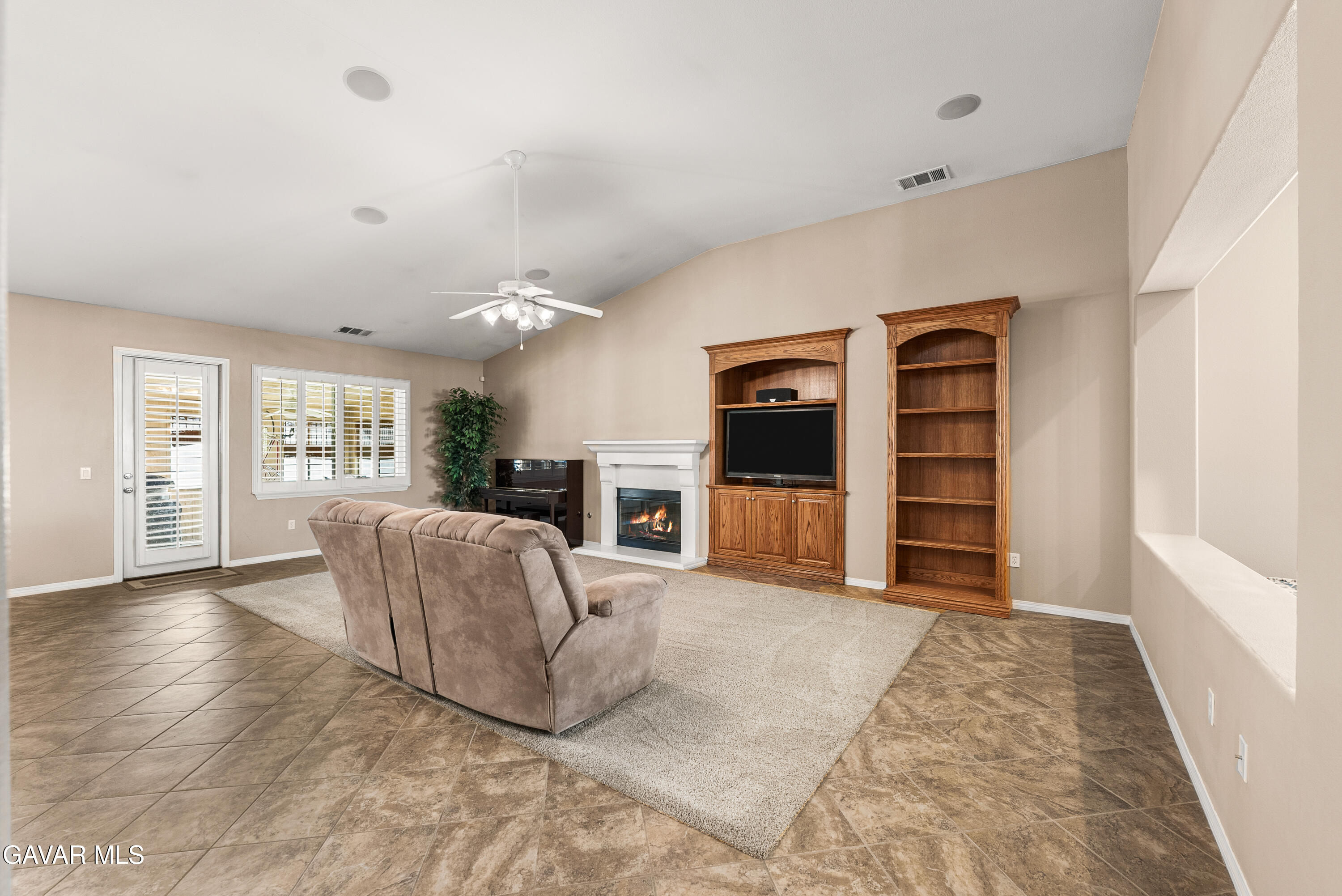 3724 Neola Way Lancaster, CA 93536 - Photo 8 of 31 a living room with furniture and kitchen view