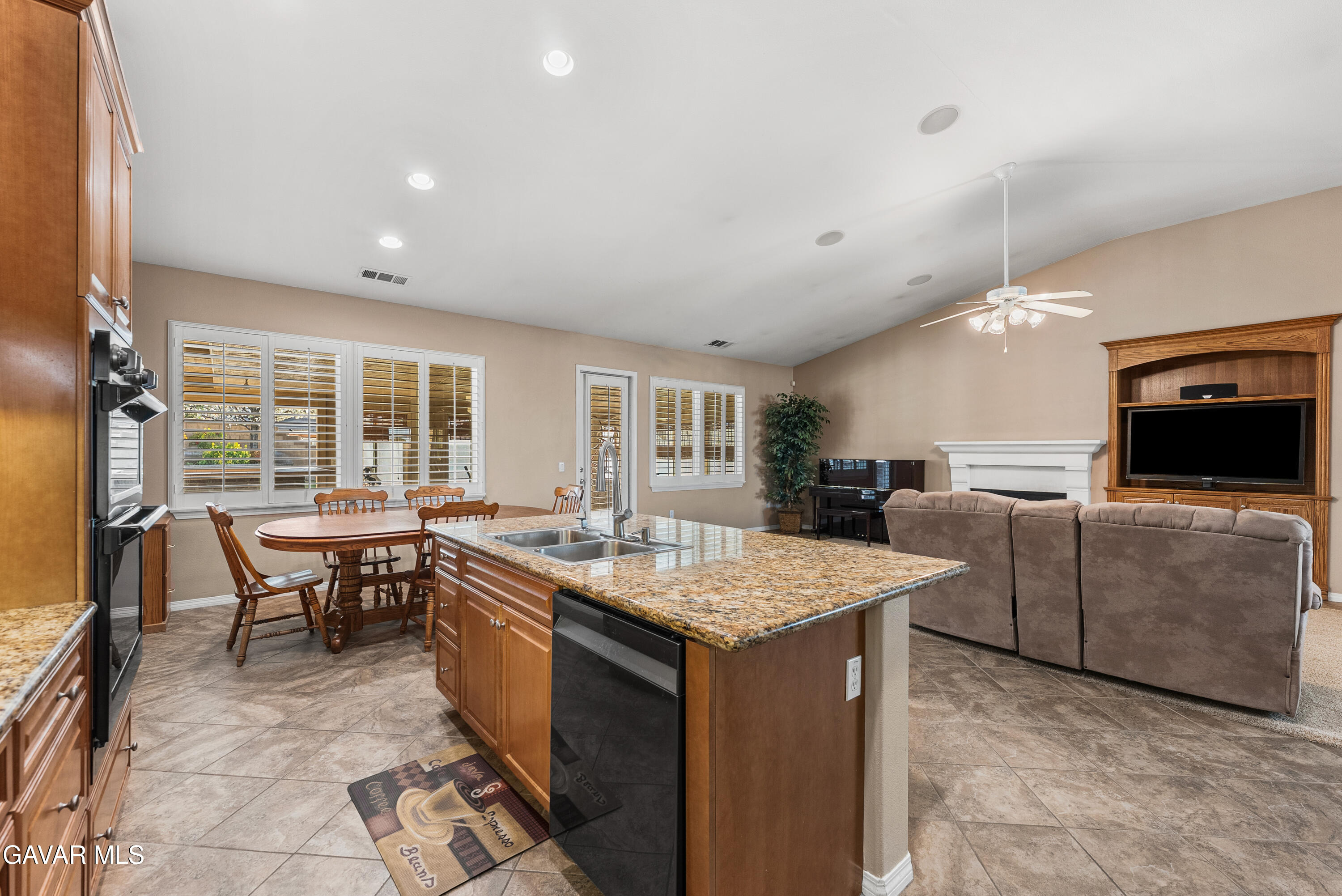 3724 Neola Way Lancaster, CA 93536 - Photo 9 of 31 a kitchen with sink cabinets and outdoor living room