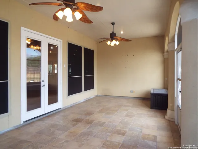 en view interior of the house and chandelier fan