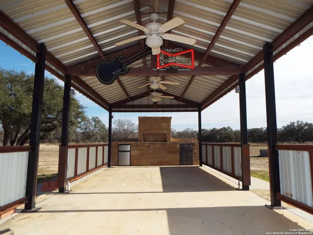 a view of garage with wooden floor