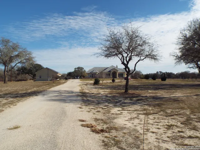 a view of a house with a ocean beach