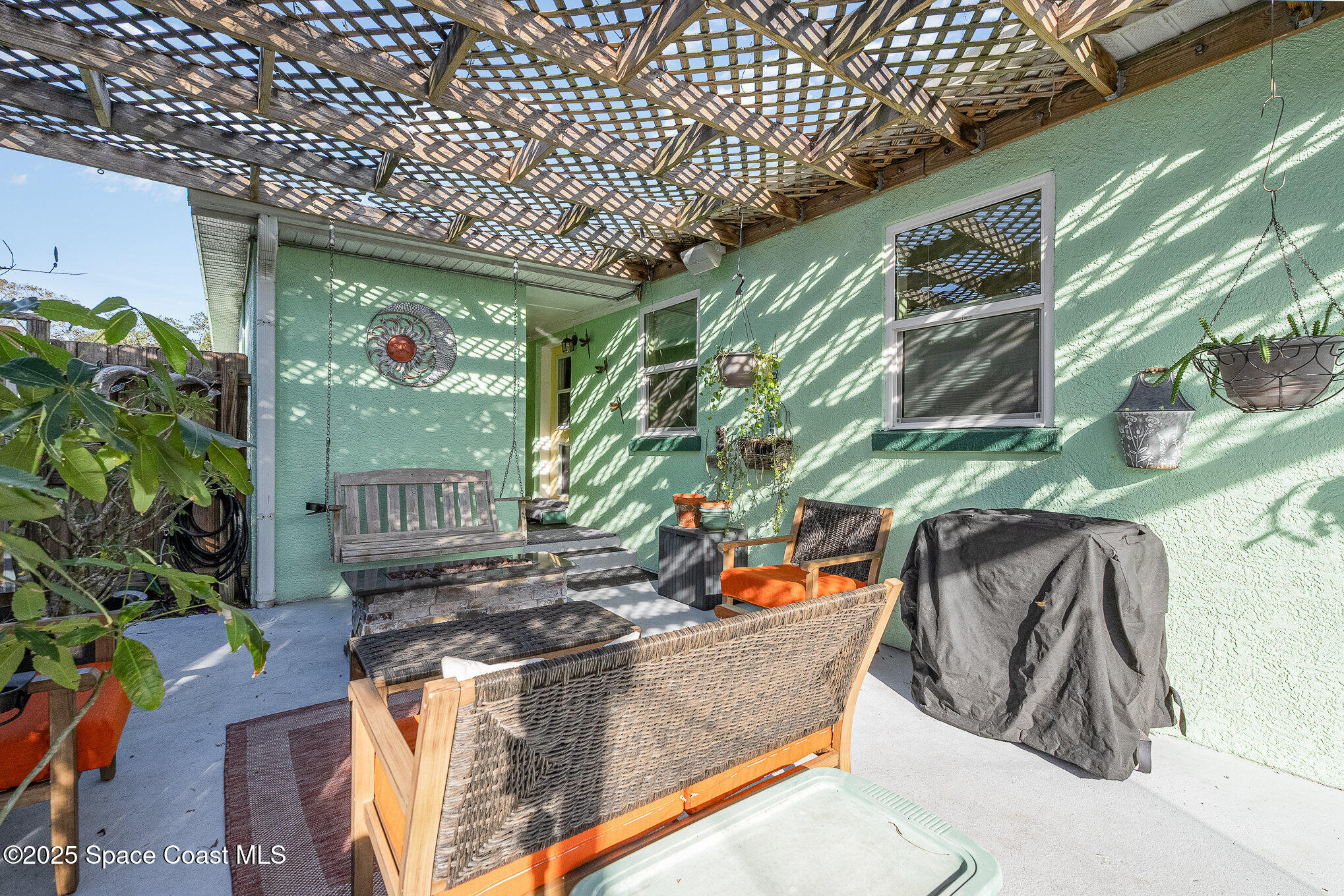 701 Espanola Way Melbourne, FL 32901 - Photo 20 of 29 a view of outdoor space with plants
