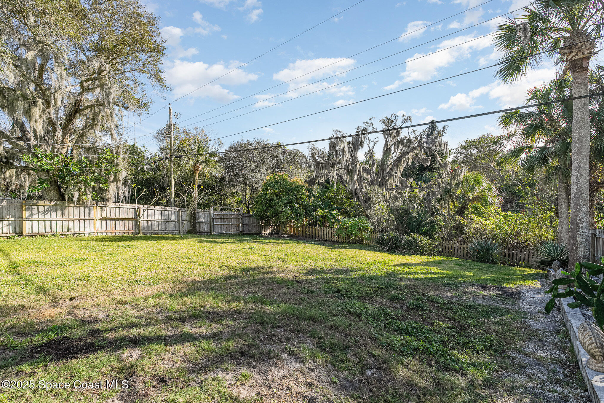 701 Espanola Way Melbourne, FL 32901 - Photo 23 of 29 a view of an outdoor space and yard