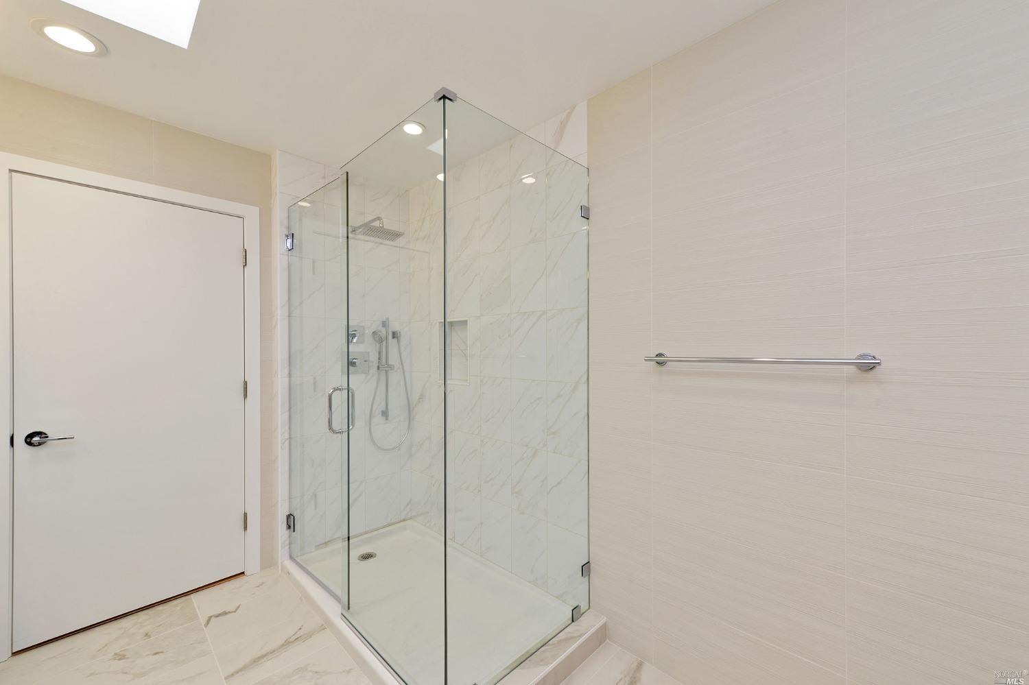 102 Red Hill Circle Tiburon, CA 94920 - Photo 13 of 20 a bathroom with a shower and a glass door