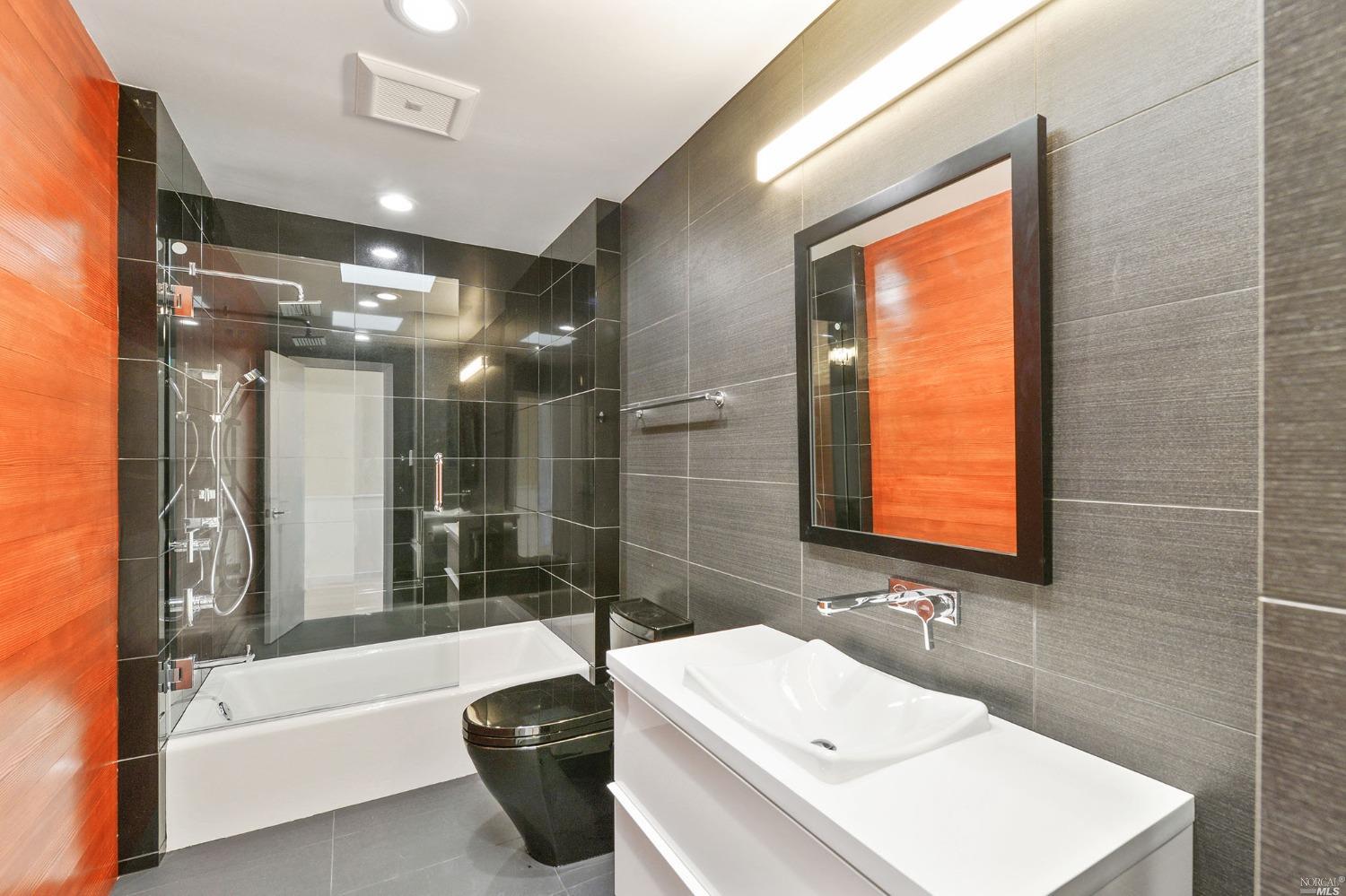 102 Red Hill Circle Tiburon, CA 94920 - Photo 14 of 20 a bathroom with a sink a toilet and shower