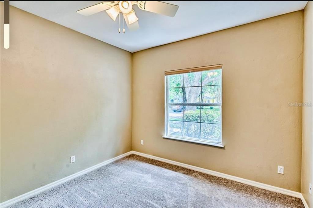 322 Northwest 50th Boulevard Gainesville, FL 32607 - Photo 12 of 19 an empty room with a window