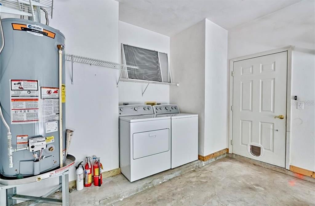 322 Northwest 50th Boulevard Gainesville, FL 32607 - Photo 19 of 19 a room with storage and utility