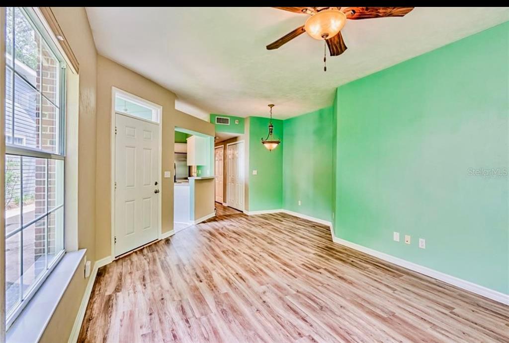 322 Northwest 50th Boulevard Gainesville, FL 32607 - Photo 4 of 19 a view of a room with a wooden floor