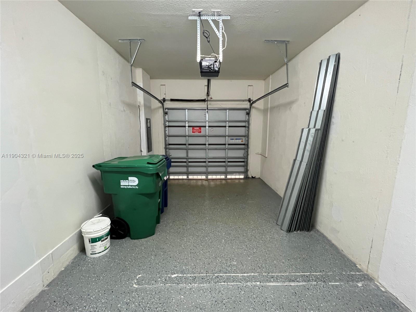 15861 Northwest 90th Court, Unit 15861 Miami Lakes, FL 33018 - Photo 21 of 31 a view of empty room with empty racks