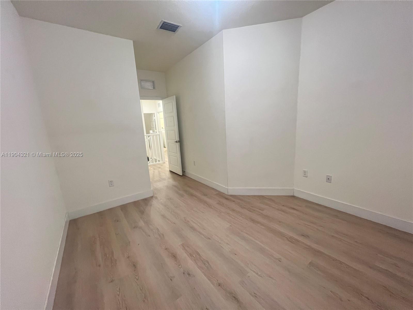 15861 Northwest 90th Court, Unit 15861 Miami Lakes, FL 33018 - Photo 26 of 31 wooden floor in a room