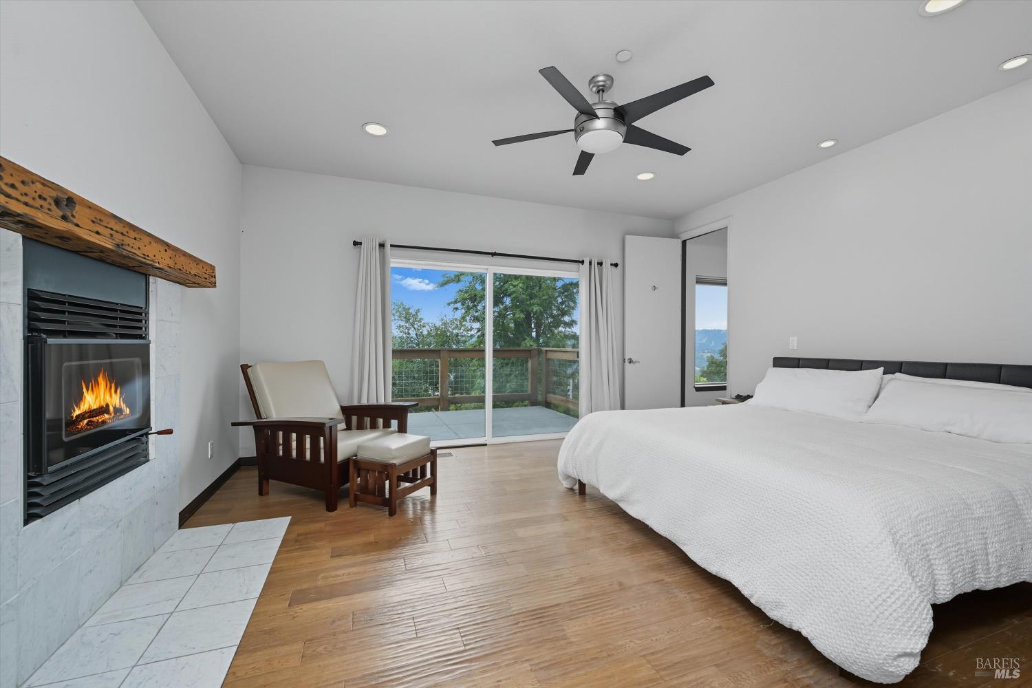 31000 Pine Mountain Road Cloverdale, CA 95425 - Photo 22 of 64 Primary Suite with bath, fireplace and deck.