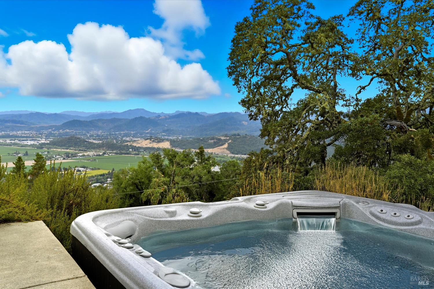 31000 Pine Mountain Road Cloverdale, CA 95425 - Photo 6 of 64 An outdoor spa offering peaceful valley and mountain views.