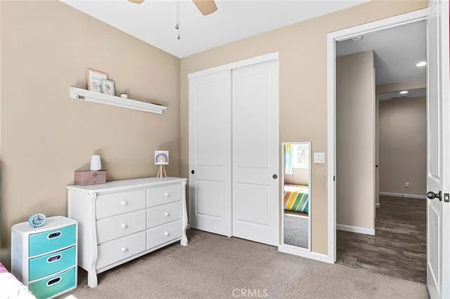 a view of room with cabinet and mirror