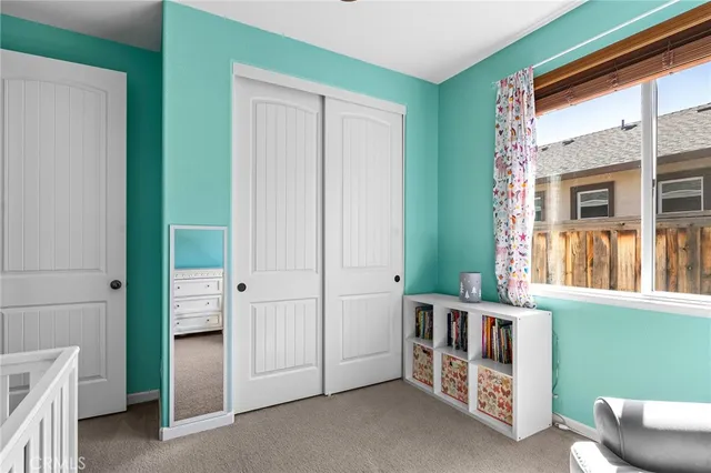 a room with window and furniture