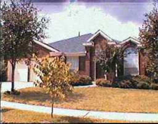 5913 Rickerhill Lane Austin, TX 78739 - Photo 1 of 1 a view of a house with a yard