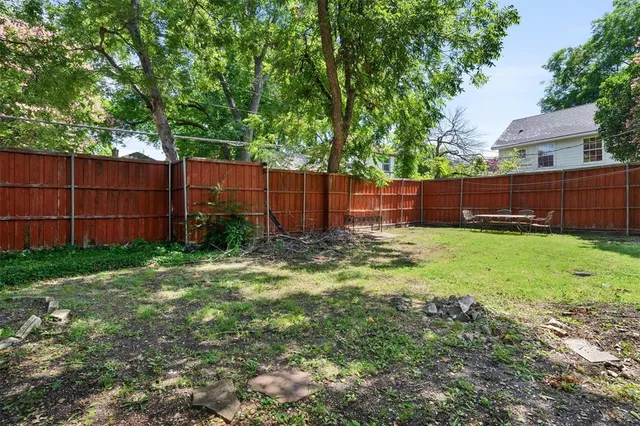 a house with trees in front of it