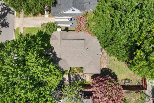 an aerial view of residential house with outdoor space