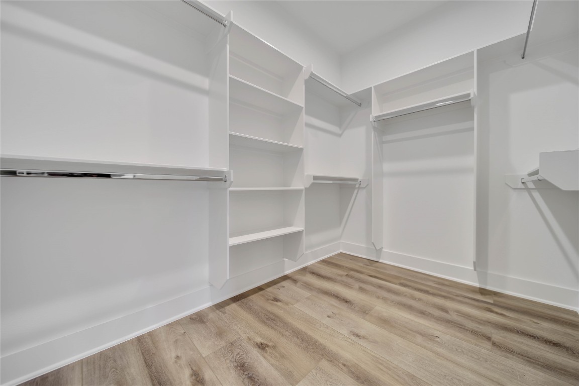 7709 Inwood Grove Lane Houston, TX 77088 - Photo 21 of 36 a view of an empty walk in closet