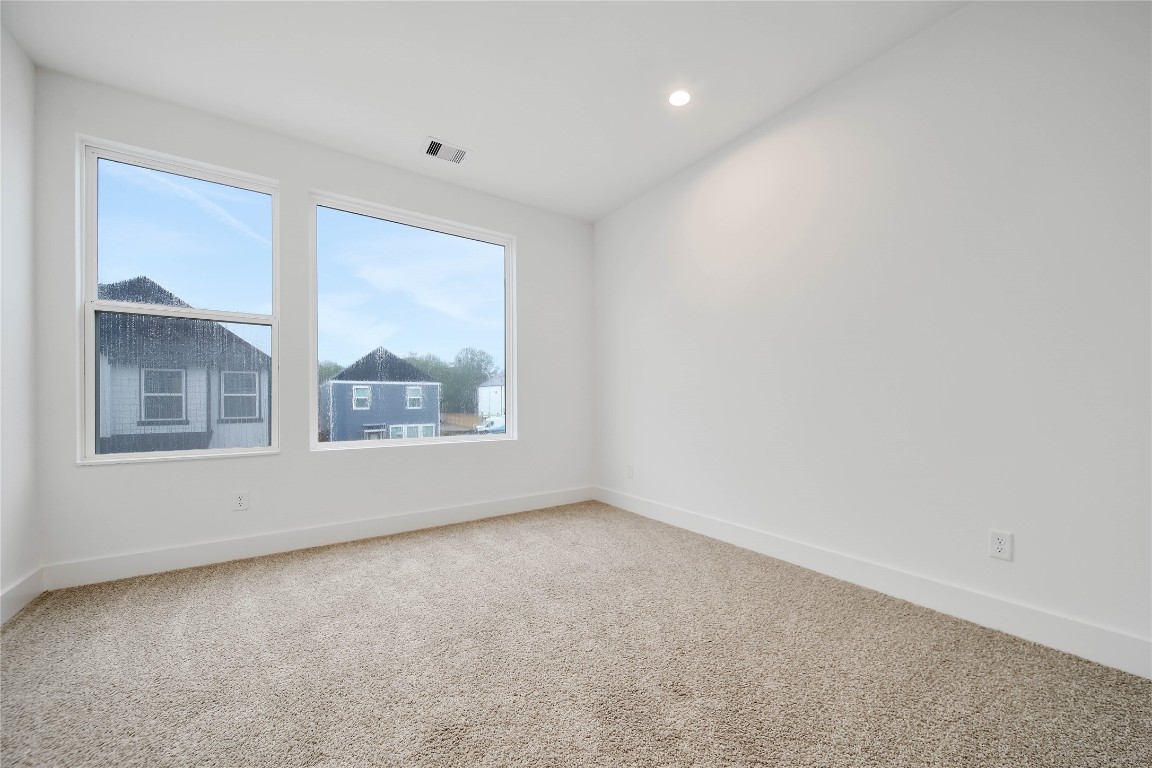 7709 Inwood Grove Lane Houston, TX 77088 - Photo 24 of 36 a view of an empty room with a window