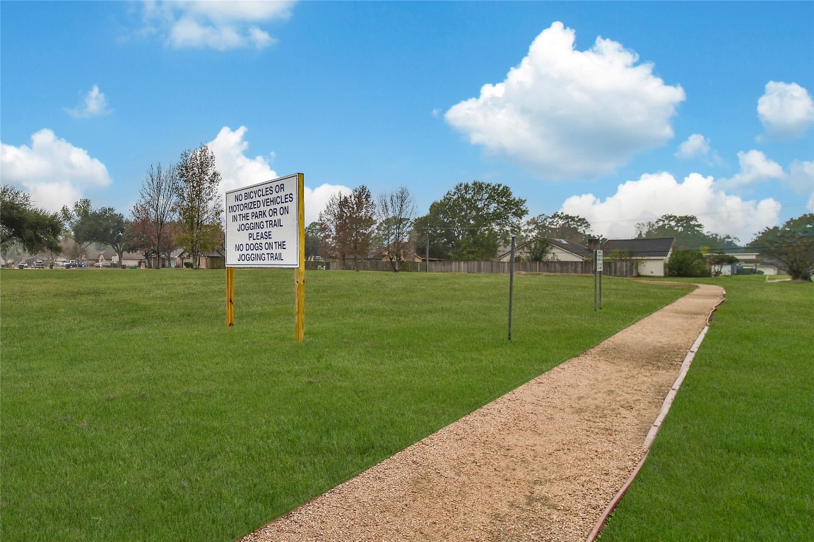 7709 Inwood Grove Lane Houston, TX 77088 - Photo 36 of 36 a view of a golf course with a big yard