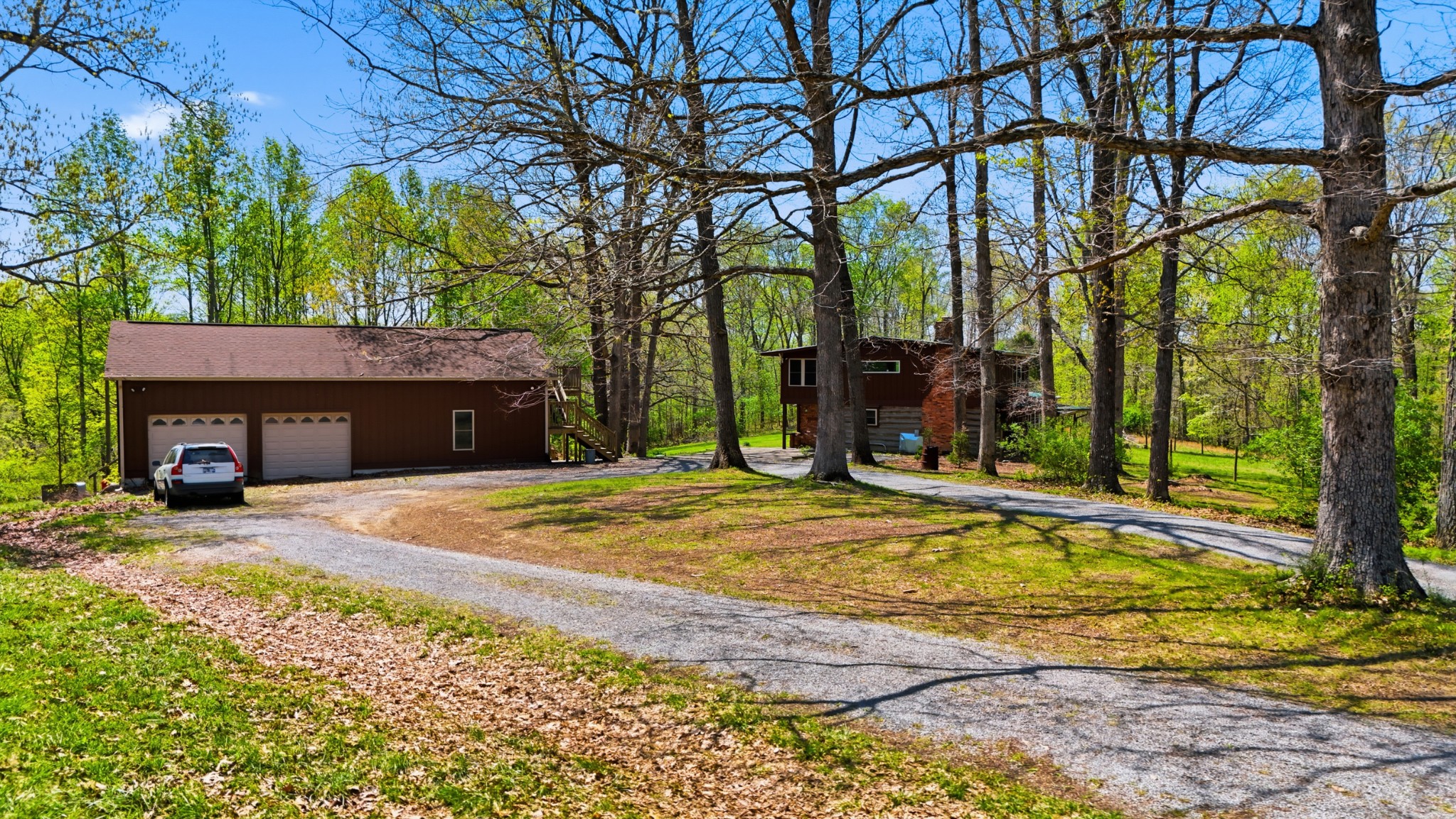 7915 Ridgewood Road Goodlettsville, TN 37072 - Photo 3 of 49 a view of a house with a yard and tree s