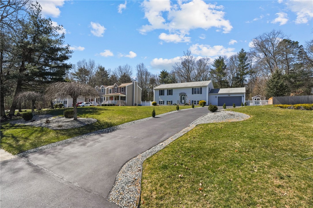 7 Walker Lane Coventry, RI 02816 - Photo 2 of 41 Nice long driveway and large front yard!