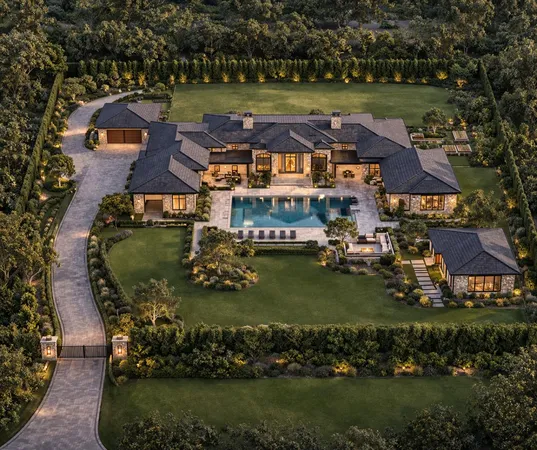 an aerial view of a house with a garden