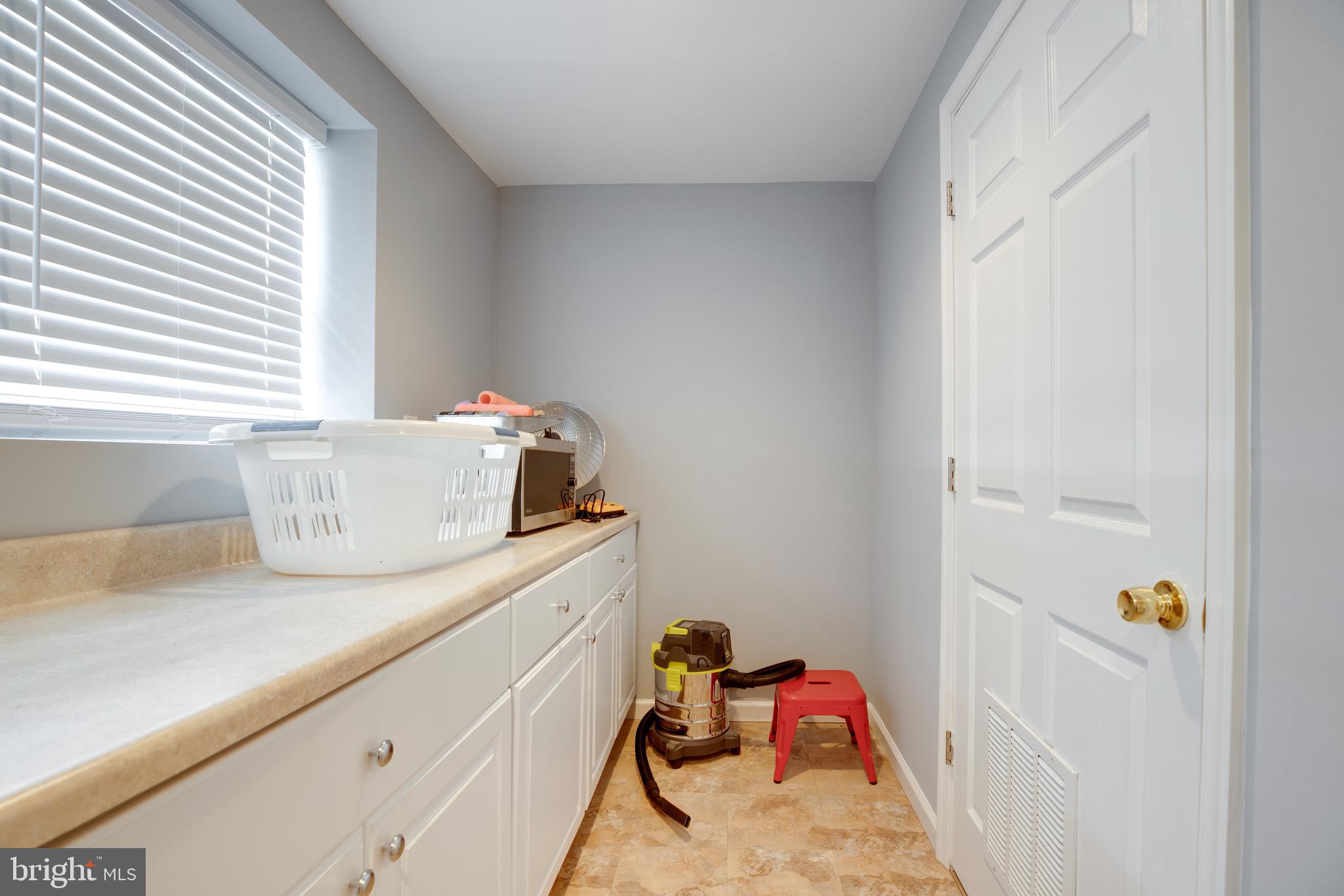 14609 Olde Kent Road Centreville, VA 20120 - Photo 16 of 33 a utility room with sink dryer and washer