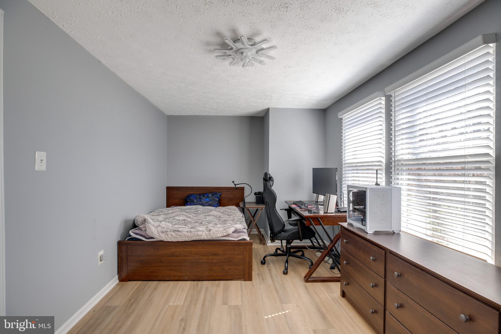 14609 Olde Kent Road Centreville, VA 20120 - Photo 27 of 33 a bed room with a bed and a window