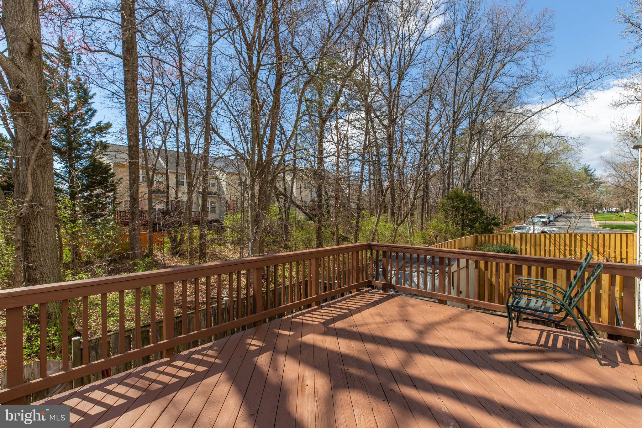 14609 Olde Kent Road Centreville, VA 20120 - Photo 30 of 33 a view of a balcony with wooden floor and fence