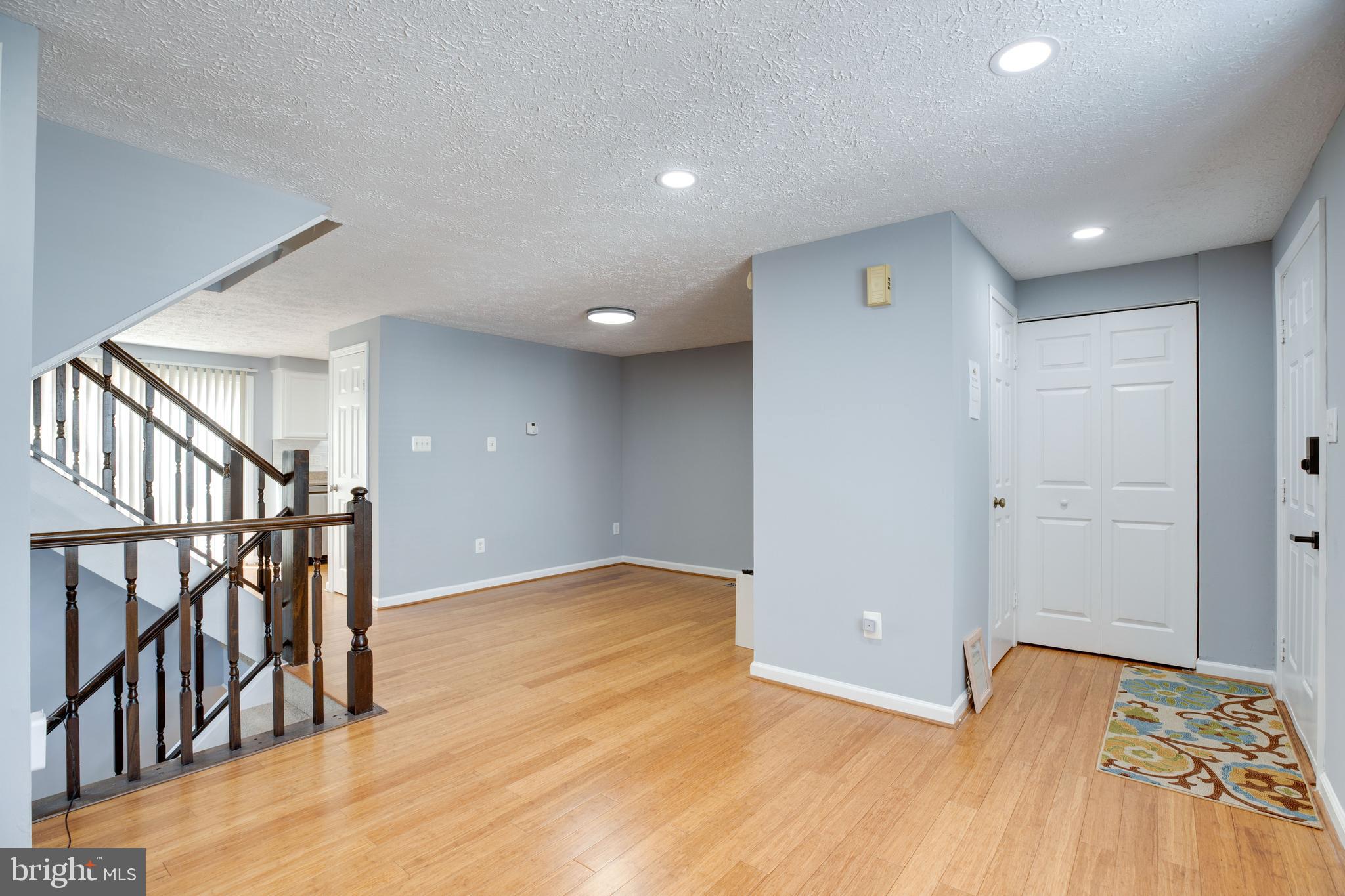 14609 Olde Kent Road Centreville, VA 20120 - Photo 3 of 33 a view of hallway with wooden floor