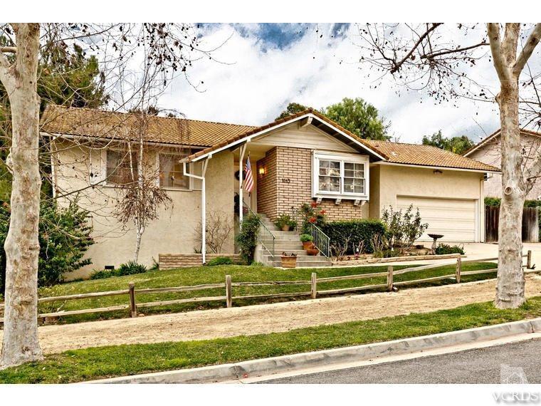 1145 Rambling Road Simi Valley, CA 93065 - Photo 1 of 30 front view of a house with a yard